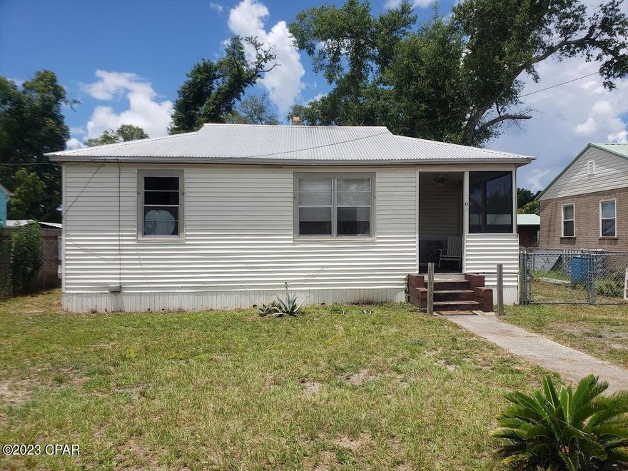 This is a great starter home or investment property. It is located in a good central location close to shopping and dining. The home is on a large lot. The backyard is fenced in two parts which makes a great area for children and pets to play. This neighborhood has a boat ramp and a nice park by the lake.  With a little updating this will be a cute Florida Cottage. Make an appointment to see it today.