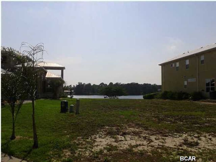 EMERALD COAST Yacht Club; This exclusive Gated Community will be limited to just 11 single family homes; Beautiful neighborhood to live or occupy as a second home retreat. This is a Water Front Lot. Only one of two Water Front Lots still available.