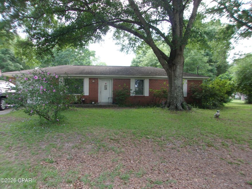 Welcome home to this charming 3-bedroom, 1.5-bath brick ranch nestled on a spacious corner lot in the peaceful small town of Esto, Florida. This inviting home features a generously sized living room that flows seamlessly into the dining area and cozy country kitchen, creating a warm and comfortable space for family gatherings and everyday living. The kitchen comes complete with a stove, refrigerator, and clothes washer for added convenience.
The half bath includes a large closet area with potential to easily add a shower or tub, offering an excellent opportunity to create a full second bath. Outside, you'll appreciate the attached one-car garage, handy outbuilding for extra storage, and the quiet surroundings that make country living so enjoyable. Conveniently located just a short drive to shopping, churches, and only about an hour from the sugar-white sands of Panama City Beach -- known as ''The World's Most Beautiful Beaches.'' Whether you're looking for a starter home, retirement spot, or investment opportunity, this property is full of potential and ready for its new owner. Come take a look today!