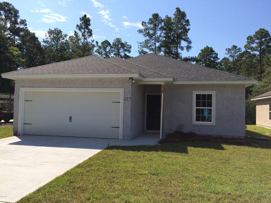 CONSTRUCTION IS NOW COMPLETE...100% FINANCING AVAILABLE ON COMPLETED HOME! NEW CONSTRUCTION IN THE HEART OF LYNN HAVEN. HOME OFFERS LARGE LIVING ROOM/DINING AREA WITH NAFCO FLOORING. THE LIVING ROOM IS SPACIOUS AND OPEN TO THE DINING AND KITCHEN AREAS. THE KITCHEN HAS STAINLESS APPLIANCES AND BREAKFAST BAR. THE MASTER SUITE HAS A LARGE WALK IN CLOSET AND SEPARATE TUB AND SHOWER. EXTERIOR FEATURES INCLUDE, REAR COVER PATIO, TWO CAR GARAGE, FULLY SODDED YARD WITH SPRINKLER SYSTEM AND SIDEWALKS. CALL TODAY TO SCHEDULE YOUR OWN PRIVATE SHOWING APT. CLICK ON PIC FOR ADDITIONAL PHOTOS, VIRTUAL TOUR, AND HOME WEBSITE. ALL AGES, SIZES, AND SCHOOL ZONES ARE APPROXIMATE.LISTING AGENT HAS OWNERSHIP INTEREST IN THIS PROPERTY