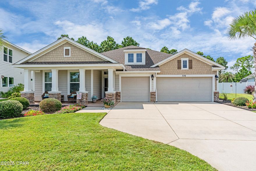 This property has sold! Discover similar listings by reaching out to us for an updated list of available properties that match your preferences. Set on one of the largest and most private lots in Breakfast Point, this 4BR/3BA home pairs open, modern living with a backyard designed for space and serenity. The oversized yard backs to wooded conservation land, creating a lush natural backdrop with no rear neighbors and shade in the mornings and afternoons. From the extended covered lanai, it's the perfect setting to relax, entertain, or simply enjoy the view. Inside, the open layout connects the living, dining, and kitchen areas under 10' ceilings with a tray ceiling detail in the great room. The kitchen combines style and function with granite counters, stainless steel appliances, under-cabinet lighting, a generous breakfast bar, and five pull-out cabinets for easy storage. A separate counter space makes an ideal coffee bar, while extra cabinetry keeps everything organized. The split floor plan offers flexibility, with one bedroom and bath tucked at the front of the home for guests, while the primary suite features double vanities, a soaking tub, and a walk-in glass shower. Additional highlights include a formal dining room, mudroom, ceiling speakers in the great room, cable outlets in every bedroom, composite wood flooring throughout with tile in the baths and laundry, and a 3-car garage. Out front, the home overlooks a neighborhood park with plenty of visitor parking, and a streetlight keeps the yard well lit in the evenings. Breakfast Point is known for its central location - Publix, shopping, and restaurants are just outside the neighborhood, schools are within walking distance, and the beach and Pier Park are only minutes away.