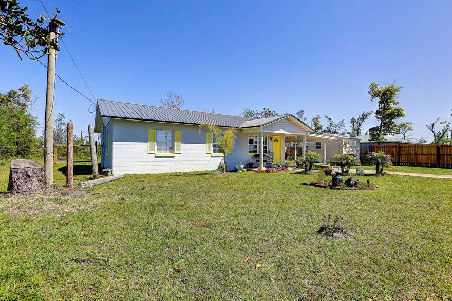 Great Location! This 3 bedroom 1 Bath home is a great value! The Interior features a spacious open layout with large kitchen, dining room & Livingroom.  There is great outdoor space with big carport, newly refreshed flowerbeds, many types of flowers & trees: lemon tree, unique palms & double palm tree. 

There is a 25 x 25 detached building that the current owner is using as a guest house, featuring a kitchenette,  living room, full bath & bedroom. The Owner will include the new 12x12 Aluminum building & Large Stainless steel refrigerator with Full Price Offer! Don't Miss this opportunity to own this great well loved home! ***Measurements Approximate Buyer to Verify if Needed***