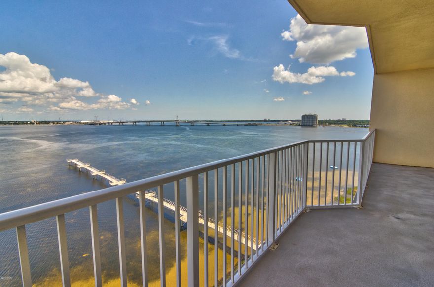Calling all boating enthusiasts! An incredible condo with its very own BOAT SLIP! Not only is this gated community gorgeous, it is also one of the few communities that are located on both Saint Andrews Bay and the Intracoastal waterway. Talk about having it all! Fishing is amazing and the views are spectacular. This development is on an elevated 10 acre peninsula with 625 feet of water frontage. The whole family will enjoy the condo not only the anglers. There is an elegant pool overlooking the Bay, tennis courts, exercise room, library, Marina and plenty of Parking. Come on, lets go fishing the Pass is only minutes away. This is a  Sweet investment and will not last long. You deserve it!