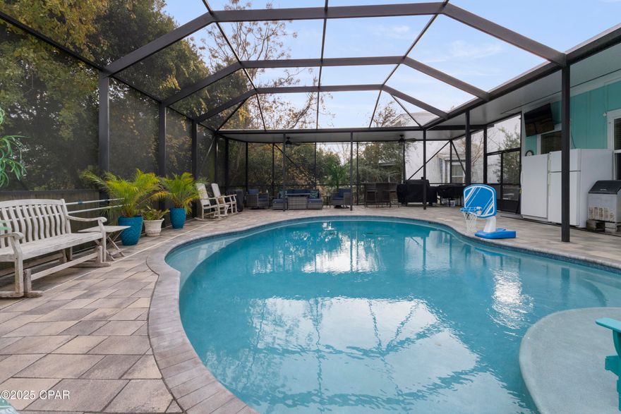 Take a look at this stunning coastal home in the heart of Panama City Beach! This home has been thoughtfully enhanced with significant improvements that elevate both style and livability. Located just half a mile from the white sandy beaches and Beach Access 64, this centrally positioned property offers easy access to everything the beach has to offer. Pier Park is just minutes away making dining, shopping, and entertainment convenient and close by.
Situated in a neighborhood that does not allow short-term rentals, the area is ideal for full-time residents who value a true sense of community and consistency year-round.  Built in 2019 and meticulously maintained, the home has been further upgraded and cared for, making it truly move-in ready.
Inside, you'll find 4 bedrooms, 3 bathrooms, and approximately 2,250 square feet of well-designed living space. The open floor plan feels bright and welcoming with plenty of natural light throughout. The kitchen serves as a true gathering place, offering granite countertops, a large island, built in wine cooler, and plenty of room for everyday meals or get-togethers.
Upstairs, a spacious family or bonus room provides flexible living space-perfect for movie nights, a home office, or a quiet retreat separate from the main living area. With generous room sizes and a well thought out layout this home offers plenty of space to grow and settle in.
The outdoor living area is where this home truly shines. A large, screened lanai overlooks a beautiful pool and expansive paver deck, creating an inviting space for entertaining friends, hosting family gatherings, or simply enjoying peaceful evenings outdoors. Pool lighting adds to the atmosphere, and a separate area outside the lanai is ideal for a firepit and relaxed conversation. 
Additional features include extra paver parking, Google Nest exterior security cameras, a programmable thermostat, and an irrigation system using reclaimed water. With extensive indoor and outdoor living space, thoughtful upgrades, and an unbeatable location, this home offers exceptional value for those ready to put down roots and enjoy coastal living at its finest.