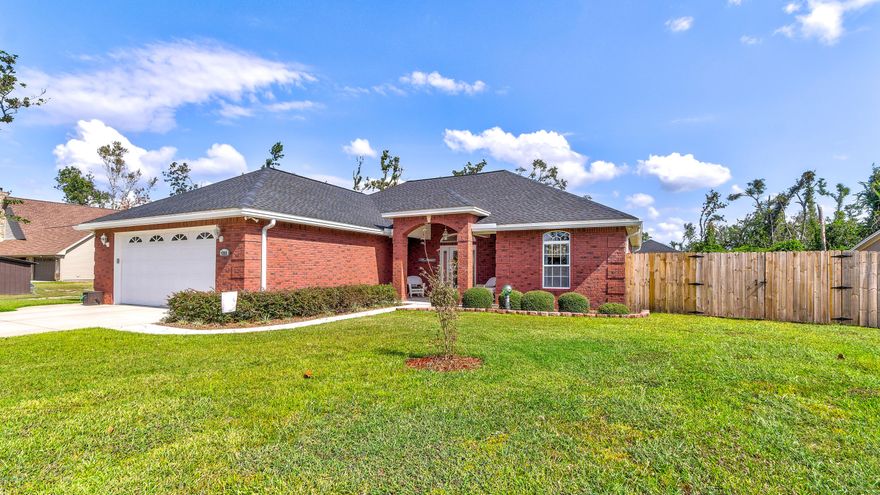 WELCOME HOME ! That's the  that feeling you'll have when you drive up to this IMMACULATE BRICK TRADITIONAL in a quiet  Deer Point Lake neighborhood. The inside is light and bright with HIGH CEILINGS, CROWN MOULDING and an OPEN FLOOR PLAN.  A custom kitchen features  beautiful wood cabinetry with lots of storage and  STAINLESS APPLIANCES .  The PRIVATE MASTER SUITE includes a spacious walk in closet and an UPSCALE MASTER BATH with  walk in shower and soaker tub.  Two guest bedrooms and a full bath allow plenty of room for everyone. A screened porch opens from the living area and adds the perfect spot for dining outside or morning coffee. The 1/2 acre lot has a   24 x 24 ft WORKSHOP  and a 12 x 30 ft Carport that is perfect for Boat Storage.