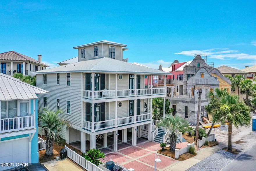 CURRENTLY UNDER CONTRACT, SELLER ACCEPTING BACKUP OFFERS This well-situated home, with multiple entertaining spaces, is perfect for creating lasting memories.  ''Family Matters,'' just one lot from the beach, with  an oversized tower, affords multiple  (2nd & 3rd floor) stunning views of the Gulf and Lake Carillon. Steps to the main community pool, this beach home offers 6 bedrooms, 4 baths, 2 laundry closets, great room, gourmet kitchen, wrap around porches,  separate media/entertainment area w/ large screen tv/surround sound,  wine cooler, ice-maker, refrigerator, microwave/stainless appliances. The lower level features a double garage with two large storage areas plus two additional coved parking spaces. Very strong rental income potential and easy show.