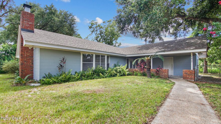 'CURRENTLY UNDER CONTRACT, SELLER WILL CONSIDER BACKUP OFFERS'  This beauty is located just over a 1/2 mile to the Gulf and white sandy beach! Nestled behind prime restaurants with a pond behind it and walking distance to lots of attractions. Concrete block home with 3 bedroom/2 bath, tons of storage, LVP flooring throughout (except master suite and sunroom; BUT seller is leaving extra LVP that will cover these areas) with NO HOA! The HUGE living room has a fireplace and beautiful new shiplap walls. The kitchen has been remodeled w/ custom cabinetry, soft close drawers & granite countertops. There are stairs to the 2nd story which is storage but could be finished to a bedroom. Chain link fenced backyard w/ shed. Great primary home, 2nd home, rental, or investment.