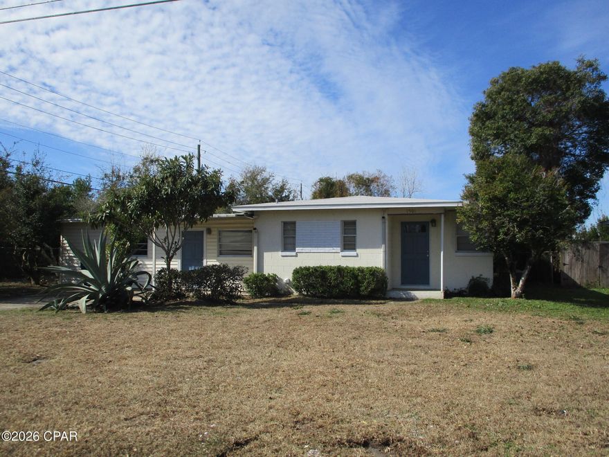 Large cozy 3br/1 ba ranch style block home on 1/4 acre corner lot in Panama City! Lots of room inside and out with 3 large living areas and a huge fenced back yard. Home is centrally located, close to schools, shopping, a lovely upgraded park and playground almost next door, and home is also not too far from the most beautiful beaches in the world!
Home is solid with lots of interior upgrade potential for the kitchen, bedrooms and the living areas. Seller will consider a flooring allowance as well. There is a large workshop and sheds in the back yard, all with electric service and gated access through gates from 19th St. Great place for pets too! Great home to make your own and priced to sell...!