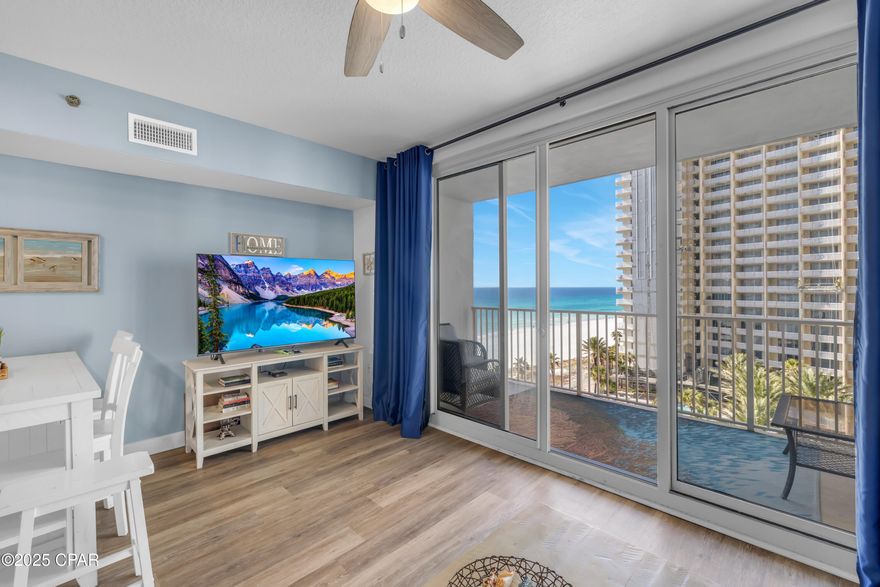 This Type-N floor plan features 1 bedroom plus a bunk area with a barn door, 2 full bathrooms, in-unit laundry, and a deeded parking spot conveniently located on the same level. The condo is fully furnished and turn-key, highlighted by new luxury floating LVP flooring, flat-screen TVs in all rooms, stainless steel appliances in the kitchen, and privacy curtains in the living room and bedroom.

The seller self-manages the unit with rental income of $55,873 in 2023 and $59,941 in 2024. Enjoy breathtaking sunsets from the west-facing balcony, overlooking the turquoise Gulf waters and vibrant pool scene, and take in stunning sunrise views from the primary bedroom window on the east side of Panama City Beach.

Shores of Panama Resort features the largest Gulf-front lagoon pool in Panama City Beach. This zero-entry tropical pool includes palm-lined islands, fountains, and a spacious hot tub, all set against resort guest exclusive beachfront access. Guests enjoy an indoor heated pool and hot tub, a 24-hour fitness center, and a seasonal poolside Tiki bar. The resort's prime location puts dining, shopping, and attractions within walking distance. Pineapple Willy's is right next door for beachfront dining, and Laketown Wharf, located across the street, offers multiple restaurant options, including The Wharf Buffet, Juan Taco, and LuLu's Bar & Resto. Covered parking, complimentary Wi-Fi, and on-site security enhance the guest experience, making Shores of Panama a sought-after destination for beachfront vacations.

All information and HOA fees are deemed accurate but should be verified by buyers if important.