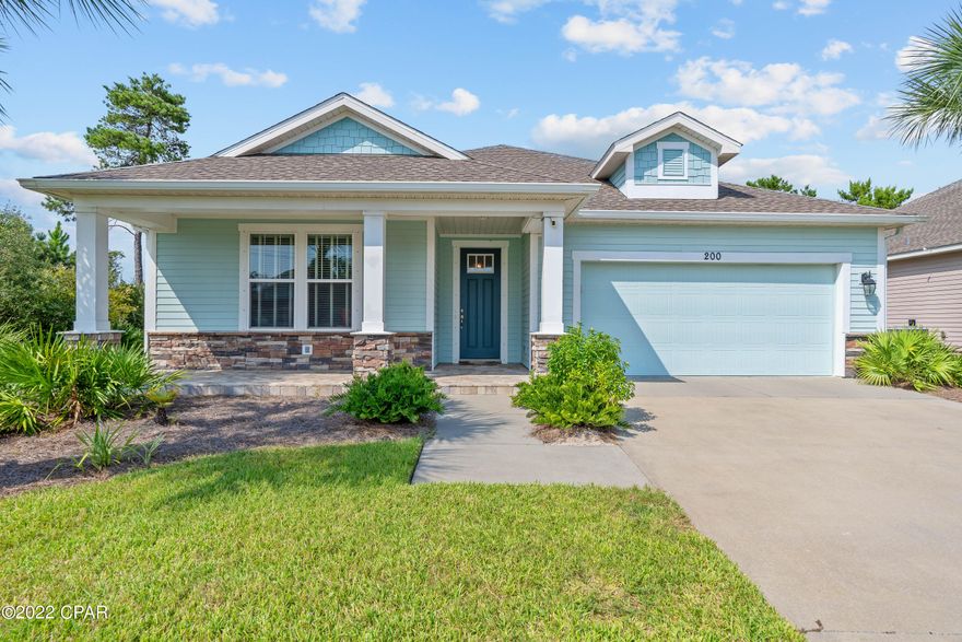 CURRENTLY UNDER CONTRACT SELLER ACCEPTING BACK UP OFFERS. Immaculate (being sold fully furnished) home located a whisper away from the Beach in the beautiful Whisper Dunes neighborhood.. Association looks after the the lawn and landscaping so you can enjoy swimming in the Community Pool or taking a stroll along the sidewalks in this sought after area in the west end of Panama City Beach. The 3 bedroom 2 bath floor plan is great and the extra screened in covered patio area is a great size perfect for entertaining.  8ft doors and high ceilings along with Quartz Countertops throughout and a separate shower and soaker tub in Master Bath.  All 3 bedrooms have walk in closets.  The yard is larger than most yards in the neighborhood as it is on a corner and has nice vinyl fencing for privacy.