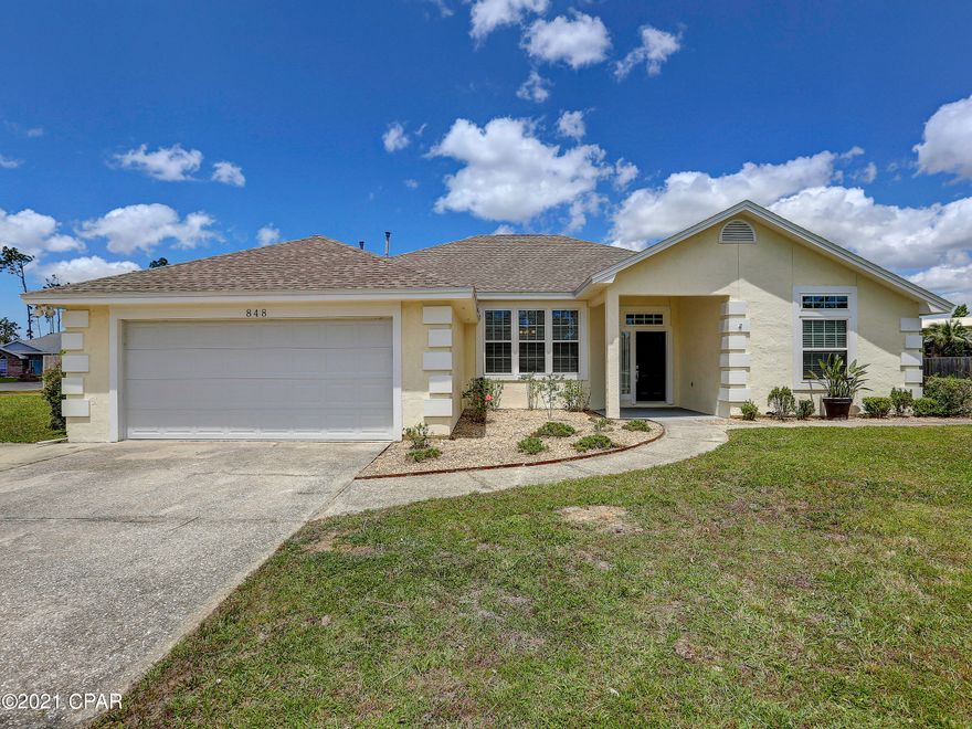 This is an executive corner home with privacy fencing and screened 14 x 28 in-ground saltwater pool with waterfall.