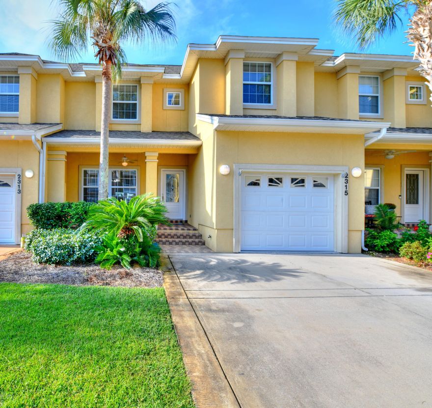 UNDER CONTRACT, CONTINGENT OFFERS ACCEPTED Beautiful and well maintained custom townhome in Pelican Bay subdivision. Features include large FIRST FLOOR master bedroom suite, with large cultured marble shower, separate vanities, private toilet room and walk in closet. Kitchen features 3 cm granite countertops, all wood custom cabinets, large breakfast bar with pass through to dining and great room, all stainless steel appliances and eat in kitchen space with bay view. Two bedrooms on second level have new carpet and views of St. Andrews Bay. Nine foot ceilings heights throughout with crown molding in living and master bed rooms. Energy efficient double paned vinyl windows. Home is wired for surround sound and security. Separate HVAC for each floor. Large storage area tucked in under the stairs, 238 feet of covered porches, front and back of house with screened in back porch. Brick paver accents in driveway, brick paver walkway and front porch. Epoxy painted garage floor. Home has a new roof (2019), has been freshly painted and is MOVE IN READY! Pelican Bay is a quiet, family-friendly neighborhood with a clubhouse, community pool, hot tub and two fishing docks on St Andrews Bay as well as a nature trail. Preservation area behind the unit for privacy and green space. Convenient to shopping, restaurants, naval base, schools, St Andrew's State Park, and the Gulf of Mexico, this is one property sure to impress!