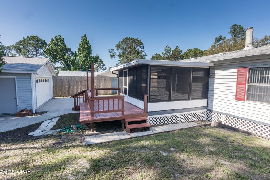 GREAT VACATION RENTAL OR SECOND HOME. This home comes fully furnished. Beautiful Florida room on the back of the home and a detached 2 car garage for all your storage needs. Wood burning Fireplace and a large living room for all your family gatherings. Lots of memories can be made here. Ask me about financing if you need it.