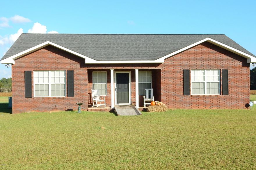 This custom built 3/2 brick beauty sits on over 3.3 acres and features large master suite with double vanity, whirlpool tub, oversized walk-in closet, eat-in kitchen with custom cabinets and stainless steel appliances, trey ceilings in the livingroom and much more. Outside features include a 24x18 detached workshop and small pond. Property is located between Chipley, Graceville and Cottondale.