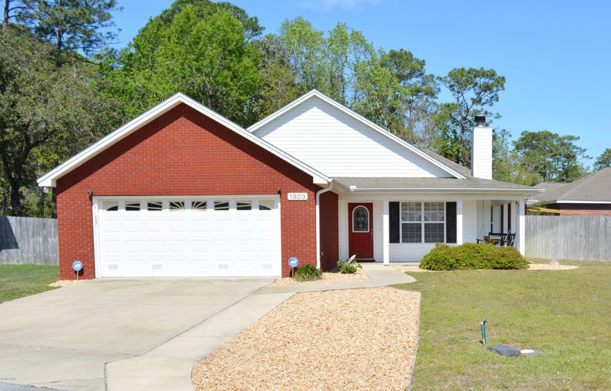 This home can't be beat! A comfortable, well-loved home with an outdoor space that feels like a retreat – all at an excellent price! This 3 bed, 2 bath home has an additional room for an office, game room or reading space. Wake up in your master bedroom looking out double doors to the sunshine and bright blue pool. Master has a walk in closet and master bath offers a double vanity, separate shower and jetted tub. Additional bedrooms are of good size and have great storage. One room offers a walk in closet and the other offers two closets. These rooms have their own bathroom and hallway door for privacy, which can be a perfect space for guests or mother in law! The beautiful eat in kitchen has a subway tile backsplash, stainless steel appliances, and a breakfast bar. The quality features of this home include a wood burning fireplace, recessed lighting, upgraded tile in kitchen and hall, bamboo floors in the office, tray ceilings in all rooms, built in blinds, separate irrigation meter, home security system and secure keypads for entry. This charmer sits at the end of a cul-de-sac, away from the bustle of through traffic. Sit on your porch swing, shaded patio or next to the sparkling pool and let the world disappear from your mind.  The home is great for someone who is looking for an outdoor space that offers it all, from a yard to play catch, salt water pool to cool down, room to garden, to a private fenced in space to simply enjoy the sunshine. The expanded driveway, double gates and extra water spout are must for the storage and cleaning of your boat or camper. Decorative paver stones, umbrella anchor, shade sail and yard shed are just a bonus to the back yard space.  The 2 car garage even has a bonus work/storage area with a peg board wall for that extra needed room. Seller has just renewed termite bond and is offering a one year home warranty for buyers peace of mind. Located in the top rated school zone, close to charter schools and approximately 15 minutes to Tyndall AFB or the beach!