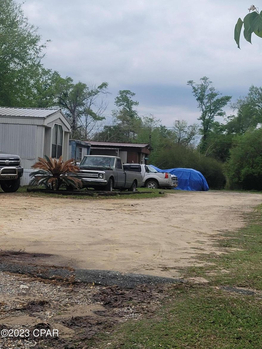 If you are looking for income producing property then this is one to see. The property has 9 power hook ups set for 9 trailer sites. There is a 2500 sq ft home on the property that can produce rental income. The property already has two deep water wells along with two large septic tanks. At one time this trailer park was rented out and can be again with a little management. Rental Property in Jackson County is in high demand. One trailer goes with the sale. All renters now are on a month to month contract.