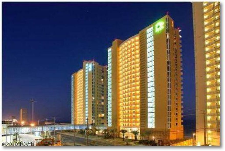 DREAM BEACH RESORT CONDO!  DIRECT GULF VIEWS AND BEACH ACCESS!  SOMETHING FOR EVERYONE!  RESORT STYLE POOLS ON BEACH SIDE INCLUDING LARGE INTERACTIVE WATER THEME PARK, JACUZZIS, LAZY RIVER.  ENJOY POOL SIDE BAR & GRILL, BEACHFRONT GAMEROOM, STATE-OF-THE-ART FITNESS ROOM WITH GULF VIEWS, MOVIE THEATRE AND MORE.  SKYWALK TO BEACH STORE AND COVERED PARKING GARAGE.   NEAR FAMOUS PIER PARK AND 30A.  EASY COMMUTE TO PCB AIRPORT. GREAT VALUE FOR DIRECT GULF FRONT!!!