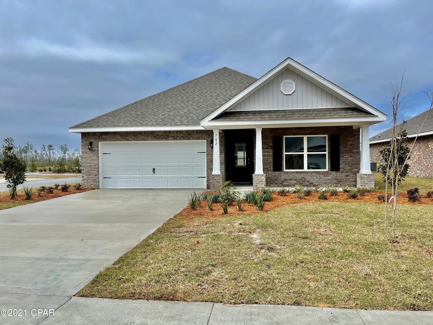 The Rhett plan features 9'ceilings throughout, luxury vinyl plank

flooring throughout the main areas and carpet in the bedrooms. This home added details of tray ceilings in living room and master bedroom, brushed nickel

hardware, granite countertops, and elegant doors. The kitchen has a center island, a nice size walk-in pantry and the appliances include smooth top range,

microwave and dishwasher. Open Kitchen to living room and dining area, makes this home perfect for entertaining. Bedroom 1 has as nice bath with walk-in

closet, garden tub and separate shower. This is a Smart Home, which is a standard package complete with Skybell door bell, Echo Dot Device, Qolsys touch

panel and KwikSet combo lock for easy entry. This home is being constructed with the Zip Sheathing system, providing greater protection than a traditional housewrap from damages due to wind, rain, and extreme weather.

A standard Smart Home package includes a KwikSet keyless entry, Skybell doorbell, automated front porch lighting, an Echo
Dot device, and Quolsys touch panel which can be integrated to control your lighting, thermostat, front door and so much more.
A builder 10 year structural warranty is also included.

Pictures, photographs, floor plans, elevations, features, colors and sizes are approximate for illustration purposes only and will vary from the homes as built. Home and community information including pricing, included features, terms, availability and amenities are subject to change and prior sale at any time without notice or obligation. For Move-In/Completion Estimates: Ready dates are estimates only. Timing of completion of construction and buyer move-in are subject to contingencies contained in home purchase agreement and governing jurisdictions issuance of a certificate of occupancy, and may change due to forces majeures and other delays or disruptions outside the reasonable control of the Builder.