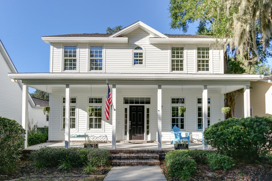 Twilight in Riverside means the porch lights come on, golf carts come out, and kids finish playing outside.  Yes this community is a real neighborhood -unlike any other in Bay County. In Riverside, all homes have front porches facing a great lawn with sidewalks so visiting among neighbors is common.  The community itself has a waterfront dock on Mill Bayou for fishing, a community center with two pools, a picnic pavilion, fitness center, pool room for owners, and a common kitchen and room where you can host larger family gatherings or parties, a playground for the kids, and basketball court.  Walking the sidewalks is a popular way to exercise in Riverside.  This particular home is a traditional style with a large covered front and back porch. The homes in Riverside face the green space so you park in the back in your two car garage and enter the back door.  This particular floorplan provides a formal living room up front for visiting or would make a great music room or study. The entire downstairs has been redone with handscraped engineered dark flooring, providing a durable floor.  A formal dining room is up front as well - with large windows looking out to the beautiful front lawn.  The kitchen has a solid surface countertop and a breakfast bar for another two or three to sit.  There is also a breakfast area adjoining the kitchen so you have so many places to enjoy.  Adjoining the kitchen and breakfast area is your den with a real wood burning fireplace.  Upstairs you will find the three ample size bedrooms and two full bath.  The carpeted areas have brand new carpet and padding starting with the stairwell!  The master is large enough for a sitting area and all rooms have a gorgeous view.  The en suite master bath has a separate shower and garden tub, a nice walk in closet, a double vanity, and private water closet.  This home has wonderful storage - in the third bedroom is a second closet, a linen closet in the hallway upstairs, and downstairs you have under the stair storage, as well as attic space in your double garage.  One perk worth mentioning - you are just across the street from one of the best schools in Bay County - Bay Haven Charter Academy! Please give your Realtor a call today to see this fabulous home - and move in quickly!