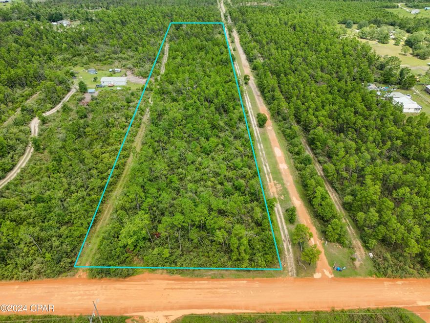 Lovely 4.99 ACRES on a quiet country road off of Highway 20 EAST. Easy access to highways and about 25 minutes from Panama City, I-10, ECP airport and more.  High and dry buildable 5 acre parcel.