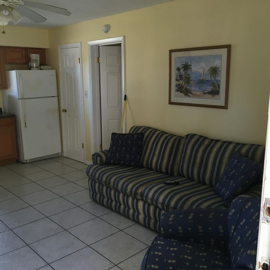 Low priced 1 bedroom condo on surf drive.  Sit by the pool and watch the waves in the waterfront complex.  Walk to all your favorite restaurants from this ground floor unit