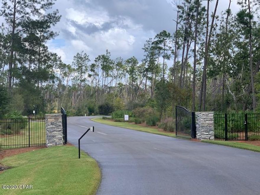 This subdivision sits on Deer Point lake.This high and dry interior lot is the perfect location for living close to the water. With  Deer Point lake and it's fresh water, Cedar Creek offers amenities galore to include canoeing, kayaking, fishing, swimming, bird watching, peaceful nights, tranquility, harmony, sunsets, and all within a short drive to Panama City. The Cedar Creek subdivision was designed with the environment in mind and is unique in that it seeks to preserve the natural habitat this gated subdivision provides. Conservation areas are located throughout the subdivision with paved, lighted, winding roads throughout. The centerpiece of the subdivision is the Summer House.