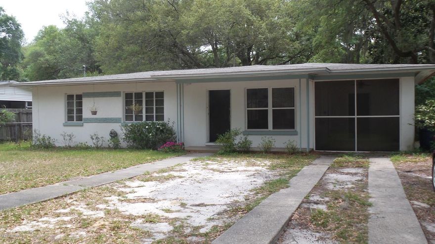 Back on the Market!  Affordable starter home in the popular Cove area!  Well maintained 3 bedroom 1 bath home with a nice screened room.  This home was built in 1941 but has an effective date per the tax records of 1979.  New roof and AC was installed approximately 2004.  This cute home has the lots of character...  All wood floors with the exception of the kitchen.  Kitchen features a new refrigerator. Large fenced backyard with alley access gate.  Call your favorite Realtor today!  (All important details like square foot, acreage, etc should be verified by the appropriate specialist.)