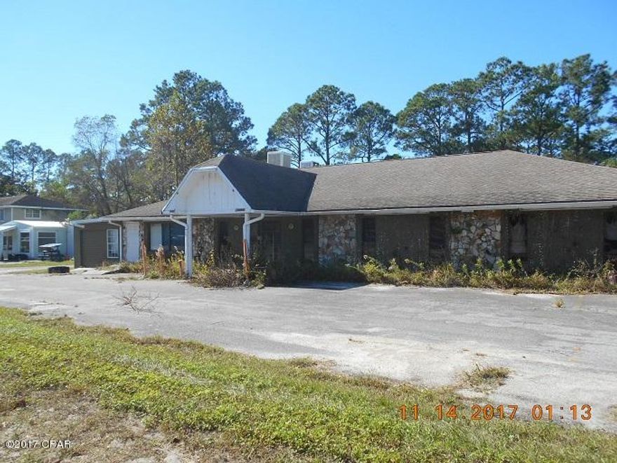 Prime commercial frontage HWY 77,  Known septic & water issues have been resolved.