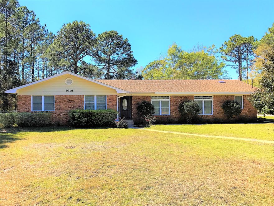 Exquisite BRICK 4BR/2.5BA on 1 full acre!---This immaculate Ranch Style home in Callaway is a must see! Interior Features include, GIGANTIC Kitchen featuring an OVERSIZED island. The large open feel of the living area flows perfectly into the dining room and to the kitchen. There is tile and hardwood found in some rooms of the house. Master Bath is very OVERSIZED boasting two separate vanity areas, a Jacuzzi, and a stand-up shower, and walk-in closet. There is also a gun safe that conveys with the property.  Exterior Features include: 1 full acre lot, large drive-way for extra parking, outdoor yard building with covered slab attached, spacious screened in porch with access points from the master suite, dining room, garage and back yard. All sizes and school zones are approx. verify if imp.