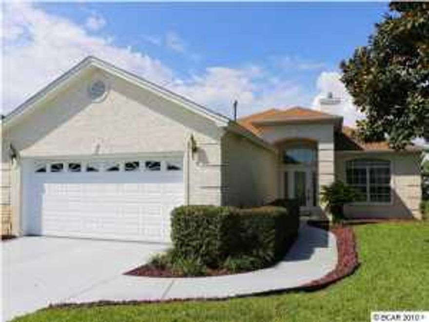 This immaculate, 3 bedroom ,2 bath home is located on the west end of the beach in the golf cart friendly Southfield community. This home is located within 1/2 mile (or 1800 feet) of the beach. Pride of ownership is evident in this lovely brick home custom built by Ron Putman Construction. The living room features a tray ceiling and gas fireplace. This home has an open floor plan with the kitchen/dining open to the living area and Florida room. The master bedroom features a walk in closet, fabulous master bath with a double vanity, garden tub and a glassed-in separate spacious shower. The master bath also opens to the marvelous Florida room. There are two additional bedrooms and another full bath; plenty of room for family and friends. This home has many upgrades such as; Pella