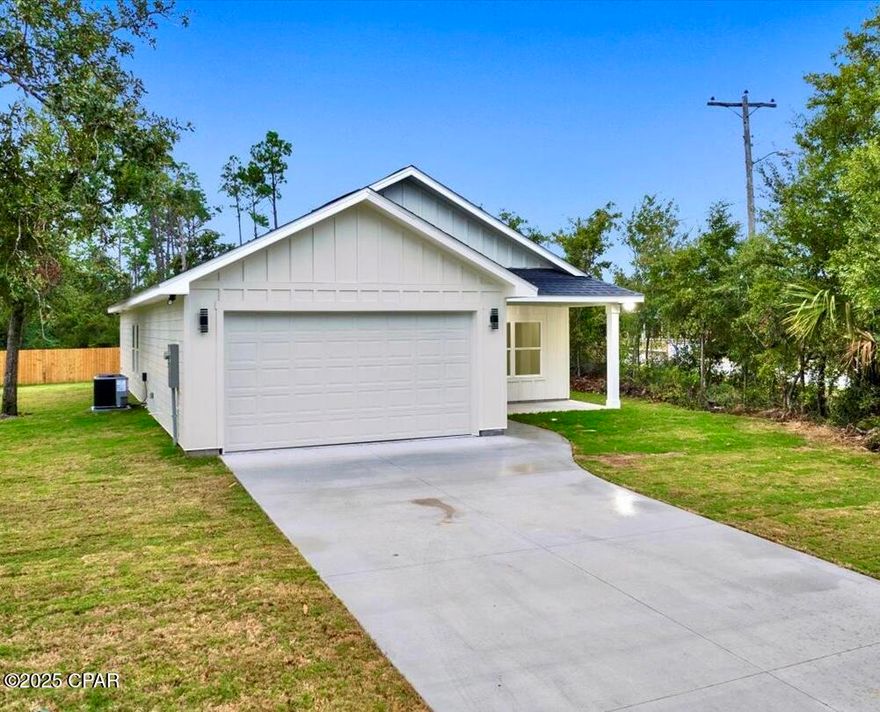 ''Second chance! Previous buyer couldn't move forward, but this home is ready for its new owner.''
Welcome to your new craftsman home in the heart of Panama City! This brand-new build home offers an unbeatable location, high and dry Flood Zone X that is literally, minutes from 23rd Street with all the shopping and dining you will need, plus hospital is around the corner and elementary school across the street. Best part is a 10-minute drive to the beach!

Inside, this 3-bedroom, 2-bathroom home features a spacious open floor plan with two-car garage! Highlights include a custom kitchen with quartz countertops, LVP flooring, and beautifully tiled showers with Delta finishes. Numerous upgrades elevate the entire living space. Keep in mind: With each home completed in Norwood, the overall value of the development will climb. .
For a slightly larger home, take a look at 2014 and 2006 Norwood Place. It offers a great floorplan with higher square footage!
 With a full-price offer, receive $10,000 in builder concessions!