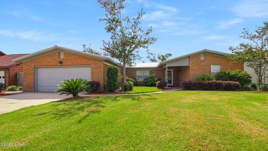 CURRENTLY UNDER CONTRACT, SELLER ACCEPTING BACKUP OFFERS'  Move in ready home in the prestigious Derby Woods neighborhood in Lynn Haven. This 3 bedroom, 2 bath open floor plan is spacious and includes a large living room with wood burning fireplace, den/office with barn door, kitchen with island/breakfast bar, spacious master suite and two additional large bedrooms on the other side of the hallway. The large backyard features a covered patio, huge 20x40 inground pool with led lights, lemon trees and privacy fence. New metal roof and sprinkler system w/well.