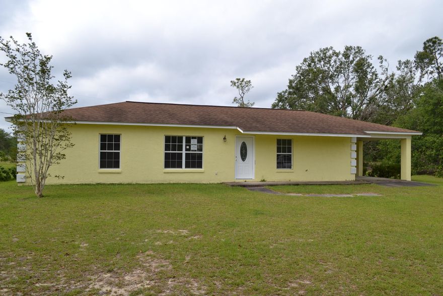 Come home to country living on 10 ACRES!!!  Block home with new paint, new carpet, new stainless dishwasher and stove/oven. Spacious open floor plan.  Home features kitchen with a breakfast bar, master bath with double vanities, master bedroom with large closet, 2 additional bedrooms, additional full bath with double vanities, attached 1 car carport, and enclosed back porch with window AC unit! This property is eligible under the FMac First Look Initiative thru 05/30/2019. During the first 20 days of being listed in MLS, only offers from owner occupants will be considered. Seller is exempt from state taxes and tax stamps on deeds, mortgages and notes (12 U.S.C 1452(e) and if payment of such state taxes or stamps is necessary to record the deed or mortgage, the tax will be paid by the Purchaser. Seller will not complete any repairs, either lender or buyer requested.