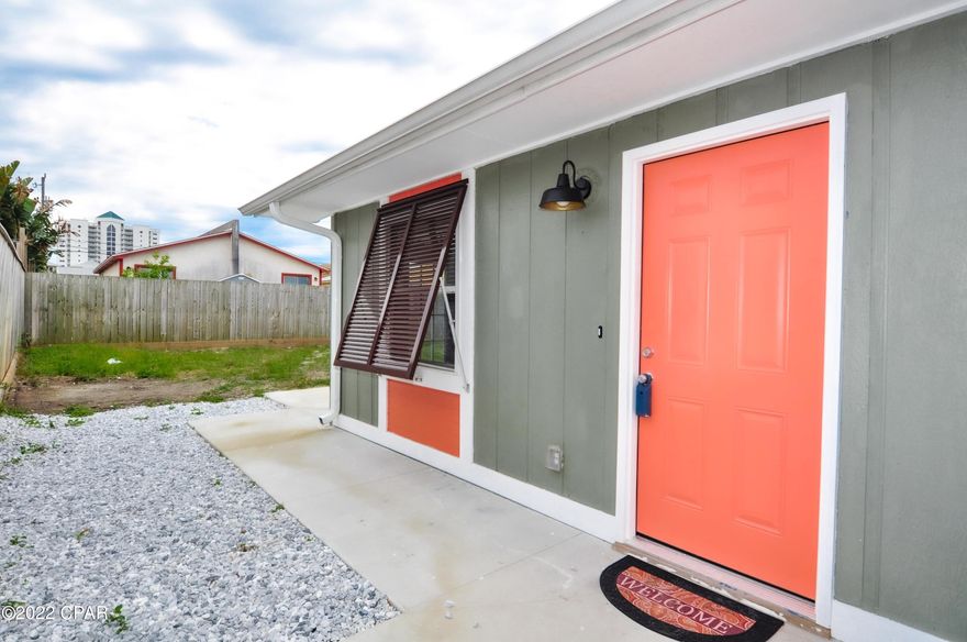 CURRENTLY UNDER CONTRACT, SELLER ACCEPTING BACKUP OFFERS.  Short-term rentals allowed for this 2BR/2BA Holiday Beach home!  Roof replaced in 2019, exterior freshly painted, Bahama shutters on all of the windows, and the home is now on sewer and sellers say there is room for a pool in the backyard!  The interior boasts all ceramic tile flooring, upgraded ceiling fan/light fixtures, and both bedrooms have walk-in closets.  Great rental investment property or second home!! You're walking distance to Grand Lagoon and just a few blocks from the beach and Gulf of Mexico.  Lots of restaurants, entertainment, shopping nearby too!  All info is approx and must be verified by Buyers if important.