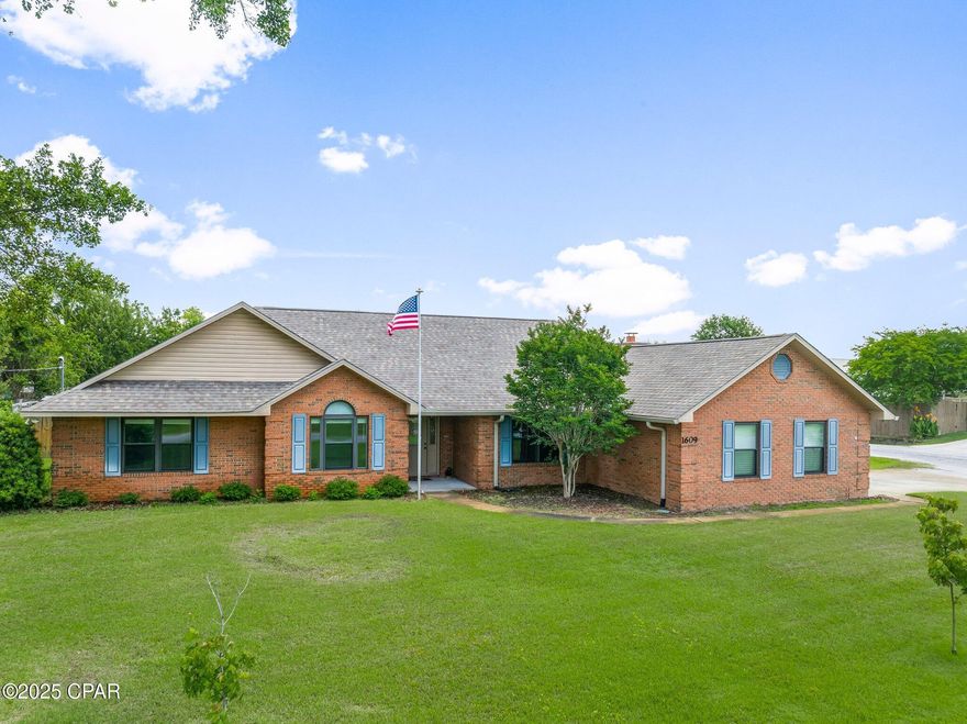 This spacious and beautifully updated 4-bedroom, 2.5-bath brick home sits on a large corner lot in one of Lynn Haven's most sought-after neighborhoods, known for its top-rated schools, family-friendly vibe, and golf cart-friendly streets. With nearly 2,500 sq ft, the home features a flexible layout with multiple living areas, a breakfast nook, and formal dining. The kitchen boasts quartz countertops, ample cabinetry, and stainless steel appliances, ideal for both everyday living and entertaining. Enjoy peace of mind with major updates: new roof, windows, and flooring (2019), new AC (2023), and new garage door opener (2024). Out back, relax by the saltwater pool or gather around the fire pit in the private backyard. The yard features a grapefruit and olive tree with plenty of room to add more. The Florida room offers bonus space year-round. The side-entry garage with additional parking on the side street adds convenience. This move-in ready home blends comfort, space, and location. Come see it for yourself!