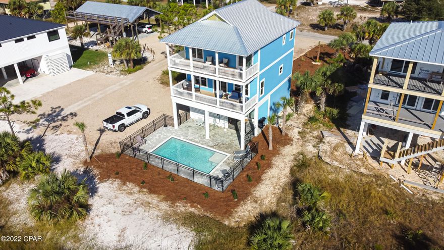 CURRENTLY UNDER CONTRACT, SELLER WILL CONSIDER BACK-UP OFFERS. ELEGANT AND NEW GULF FRONT HOME with investment income! This comfortable 4 bedroom, 3 bath home boasts a large open floor plan, private pool, expansive Gulf views, and plenty of outdoor space to enjoy. Lots of indoor and outdoor seating for large gatherings while you watch the sunset over the Gulf. Home also qualifies for FEMA flood insurance and sits close to the Indian Pass boat ramp. Go enjoy the famous Indian Pass raw bar, sit on the beach and let your worries fade and you are only a short drive into Port St Joe for the local restaurants, music and shopping. Brand new construction with metal roof, hardi board siding and Hurricane strength windows/doors. Home is generating great income.