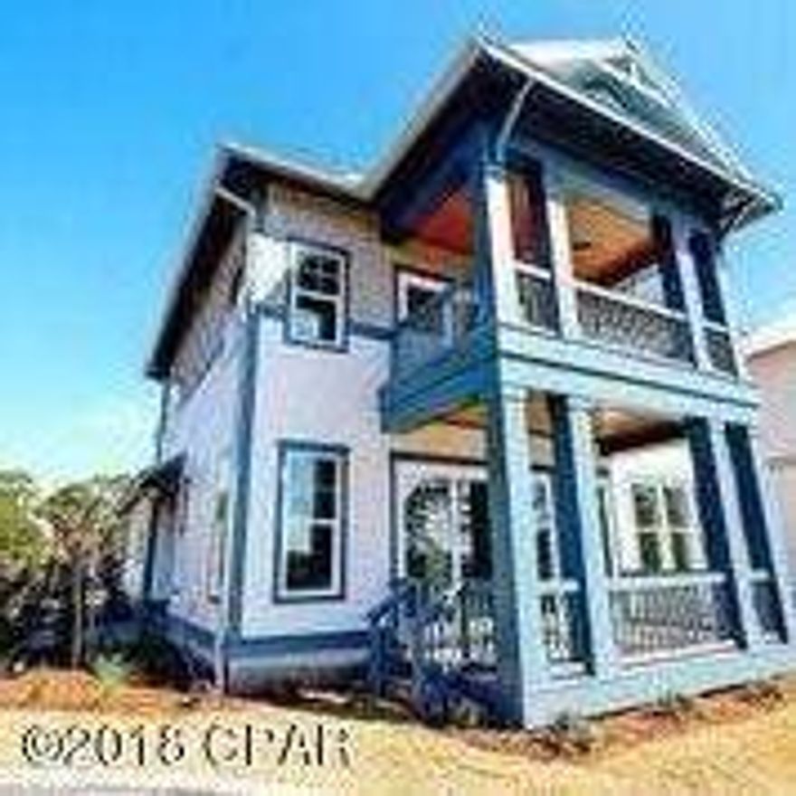 Magnificent brand new 4 bedroom home with private boat slip in Tidewater Creek, a new lagoon front development on North Lagoon Dr. Professionally decorated with quartz countertops, beautiful lighting, and stylish tile floors and bathrooms. Features include waterviews of Grand Lagoon, private boat slip, downstairs master bedroom suite, high ceilings with crown molding, an island kitchen with a gas range, walk-in pantry and walk-in laundry room, plus a tankless gas hot water heater. Energy efficient features include spray foam  insulation, 16 seer HVAC systems, and energy star appliances. Tidewater Creek will be gated and have a pool and clubhouse; Walk or bike to JMichaels, Capt Andersons, Publix, or Winn Dixie.