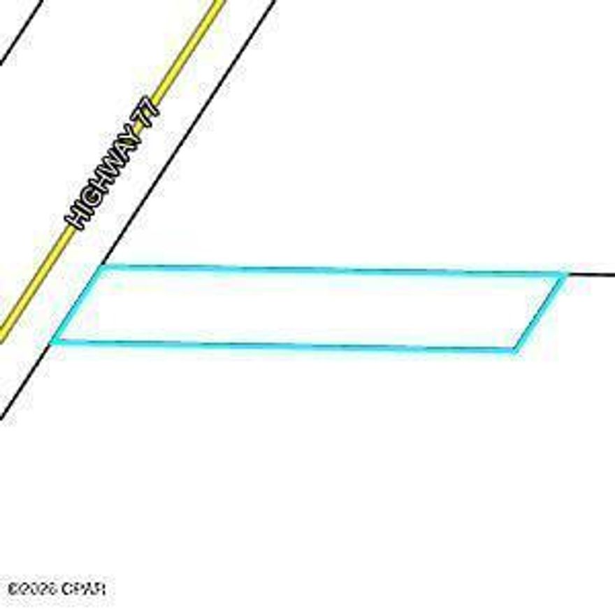 A LITTLE OVER ONE ACRE OF COMMERCIAL LAND WITH 100' FRONTING HWY 77. SELLER OFFERING FINANCING WITH 10% DOWN, 6% INTEREST WITH PAYMENTS BASED ON A 30 YEAR TERM WITH A 7 YEAR BALLOON. BROKER IS RELATED TO THE SELLER.