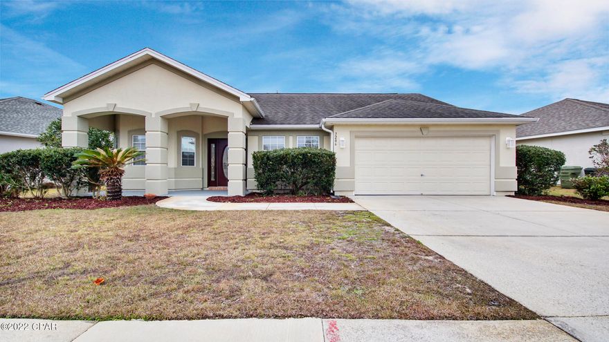 Beautiful home is located in the Hammock's in Lynn Haven. This home offers extensive tile flooring, tasteful interior colors, and a recently painted exterior. You will love the open floor plan, spacious dining area, and a heated and cooled Florida room (perfect space for the home office or craft room). The kitchen features tile flooring, oak cabinetry, solid surface counter tops, and recessed lighting. The master bedroom suite is both spacious and private. This ''move-in'' ready home is convenient to both military bases (25-30 minute drive to either base) and just minutes away from Lynn Haven's Publix shopping center and Panama City's 23rd Street shopping and restaurant corridor. This neighborhood is serviced by Hiland Park Elementary, Mowat Middle, and Mosley High schools.