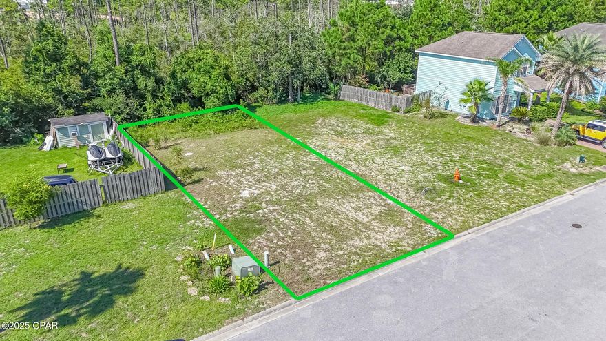 Build your dream home in the desirable Harrison's Walk community, located in the heart of Panama City Beach and just a half-mile from the emerald waters and sugar-white sands of the Gulf. This 0.09-acre lot offers a prime location with a 45' x 90' footprint, giving you the perfect canvas for your coastal retreat.

Harrison's Walk is a gated neighborhood with a private entrance and 24-hour security, ensuring both privacy and peace of mind. Residents enjoy access to a sparkling community pool, well-maintained grounds, and quiet streets with no through traffic. Shopping, dining, and entertainment are all just minutes away, making it easy to enjoy everything this vibrant beach town has to offer.

Public water and sewer are available, and with low HOA fees, you can focus on creating the home you've always envisioned. This is your opportunity to enjoy coastal living in one of Panama City Beach's most convenient locations.