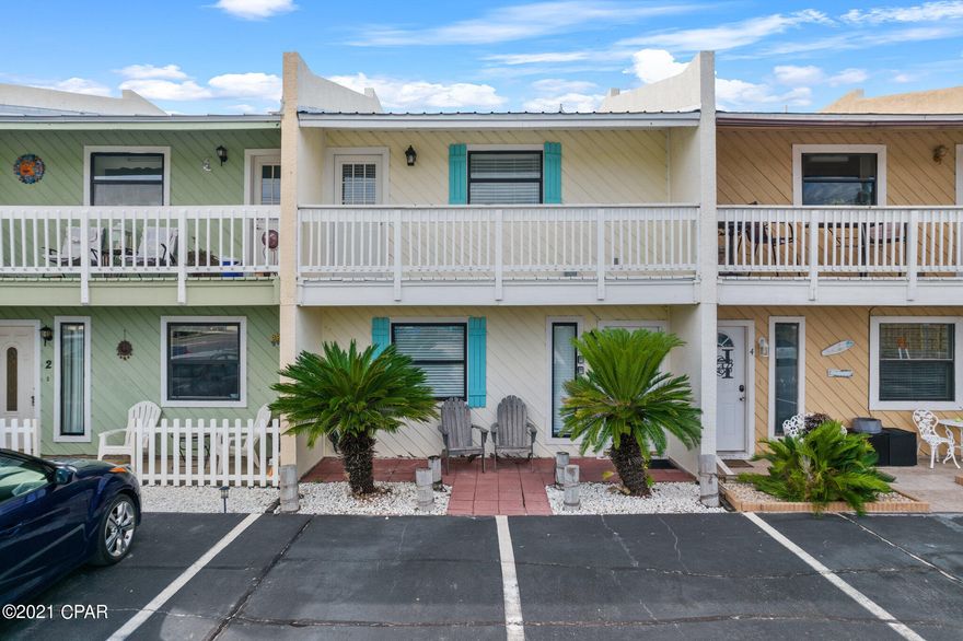 TURN KEY established vacation rental! ''The Sage'' is a Fully furnished townhouse  with pool right on Thomas Drive, in Panama City Beach, Florida. Step out onto the upstairs FRONT balcony to feel the breeze from the beach across the street, also enjoy the views from the BACK balcony of the Princess Condominium and a glimpse of the Gulf! Tile floors through the entire unit. Master and guest bedrooms downstairs, plus laundry and storage. Upstairs you'll find the Living room, and kitchen with granite countertops. The back patio is fenced for privacy and also provides direct access to the pool. 2021 Revenue from May-AUG was $41,632. Annual gross short term rental income projections are $60k+. Low density complex with only 9 units and a private pool. Fee simple with ownership of the land. All measurements are deemed correct, buyers should verify if they are important.