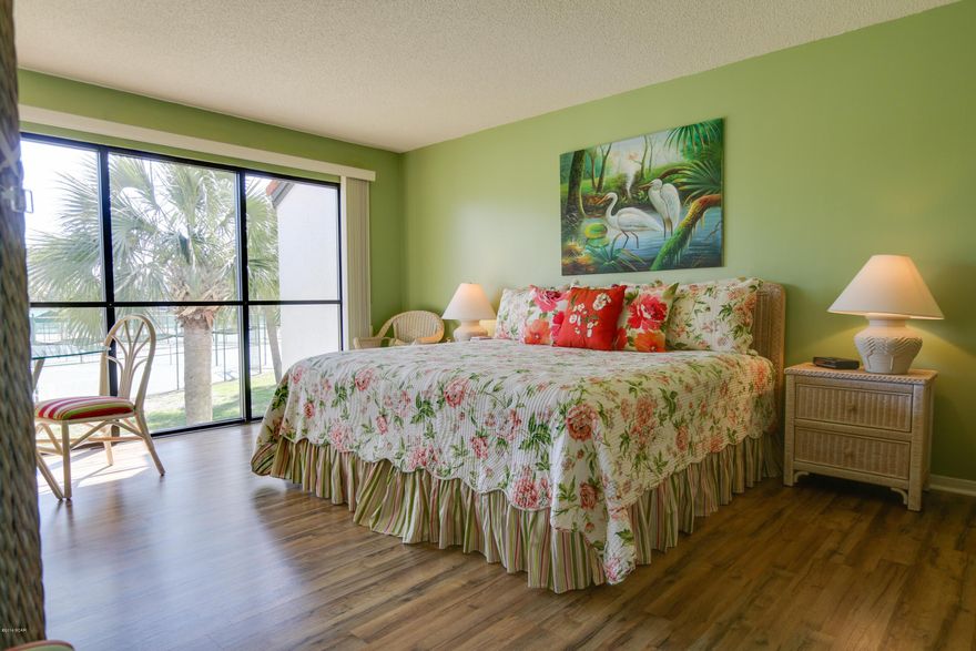 JUST REDUCED! MOTIVATED SELLER!  Make an Offer on this Gorgeous, much desired corner unit offers so much including private entry, 3 bedroom 3 bath. Completely furnished,  Flat Screen TV's, Modem for internet and Custom upgrades. 2 Balcony's with  Master Bedroom overlooking the beautiful yard and tennis courts. New floor to ceiling Windows in Master. One of the guest bedrooms offers a balcony over looking 3 par Golf Course. Beautiful flooring in all 3 bedrooms and tile in the Living areas. The drop ceilings have been removed from the kitchen, hall and bathrooms. New paint and new exhaust fans in all bathrooms. Free golf, tennis, full gym with organized exercise classes, and seasonal activities for all ages such as scuba class