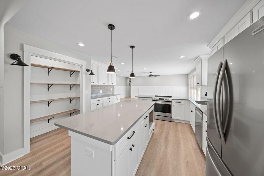 Welcome to your next favorite place to call home! This spacious brick beauty sits on a generous third of an acre in the sought-after Derby Woods subdivision in Lynn Haven. With five bedrooms and two bathrooms spread across over 2,250 square feet, there's plenty of room to stretch out and get comfortable.

Inside, you'll love the open-concept layout that flows from the large dining room into a beautiful living room complete with a cozy fireplace -- perfect for those cooler Florida evenings. The kitchen is a real showstopper with quartz countertops, stainless steel appliances, soft-close cabinets, and a handy island that's great for meal prep or casual hangouts.

The neighborhood hits all the right notes too. You're just a quick drive from North Bay Haven Charter Academy and Mosley High School, making school drop-offs a breeze. Publix is right down the road for grocery runs, and Florida State University Panama City campus is only about ten miles away. The property offers an easy commute to Tyndall Air Force Base. Plus, Gulf Coast Hospital is conveniently nearby.

Outside, you'll enjoy the spacious lot with underground utilities keeping the views clean and tidy. The two-car garage rounds things out with plenty of storage and parking space.

This one checks a lot of boxes at a price point that makes sense for the area. Don't let it slip away -- schedule your showing today and see it for yourself!