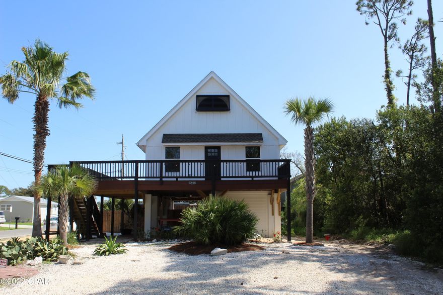 Charming beach house with stunning deck views of the Bay. This 3bed/3bath home is 226 feet to the Dolphin boat ramp and 4 blocks away from the Gulf of Mexico. A fully-fenced in backyard allows enough room to add a pool or park your boat. There are two storage units below the house. Hilltop has 200-amp service, more than adequate to service lower level storage units, already wired, stubbed for bathroom and ready to finish for extra income. Zoned for short-term/long-term rentals. This house boasts upgrades within the past year. A new roof, new cement pylons, new batten board siding, new hurricane shutter and impact windows, new HVAC, new water heater & crown molding in the kitchen! Buyer to verify all information regarding property**