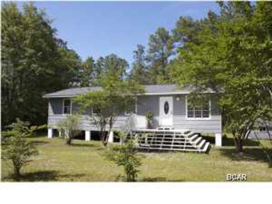 JUST REDUCED... Seller said ''get it sold''.... Cute Starter or Rental Home. Perfect for the snowbirds too! This cute Cottage is located just a block from paved road on a county maintained dirt road. Private, yet not to far to town or the beach. This home has had almost all the remodel completed for you, a few projects need to be done, by the new owner. This home has new windows, new 25 year roof, new sinks, new kitchen cabinets, new tile back splash, upgraded keyless front door, new ceilings, new plumbing. YOU MUST COME AND SEE THIS HOME. This home features new laminate hardwood floors, open living space, new light fixtures and new ceiling fans . The main bath has a large walk-in new tiled shower with a beautiful new vanity and new sink. The bedrooms are spacious, large closets.Got to see