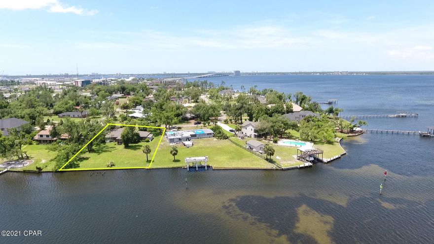 Rare waterfront home well maintained by original family with 100' of waterfront on Posten Bayou...adjacent to FSU campus. Surrounded by a quaint neighborhood safe to walk and bike.  Original subway tile floors in the baths with retro feel, open view to the bayou from the living room, dining room and formal den. Dining room and den have trey ceiling detail. Wood floors add warmth Formal den has fireplace and warm wood wall covering giving it an old world feel. Small Florida room extends from the living room for a view of the bayou and small peak of North Bay. Large laundry room and full bath adjacent to den. Appliances are in working condition. Large landscaped front and backyard. Home has one corner in flood zone and policy rung $1100 per year. Den on south side can be a bedroom with bath