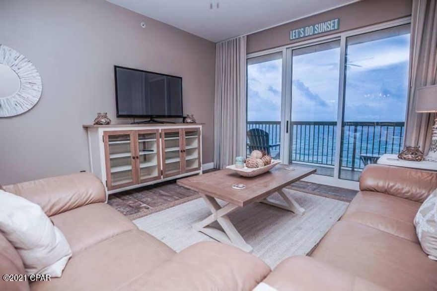 Sea La Vie is a 3 Br/2Ba condo on one of the most desirable floors (8th) Tower 1 of Calypso. Within walking distance is Pier Park and many PCB Attractions. Recently renovated and includes tile wood look floors in a unique boardwalk pattern throughout the condo.  The kitchen was upgraded with stainless steel appliances, under counter lighting and a beach inspired backsplash. The bathroom renovation includes new tubs & floor to ceiling tile. Custom linen draperies on gulf view windows include blackout backings. The condo comes with new furniture including bedroom suited for all three bedrooms (2 kings, 1 queen), family room furniture with a pull-out sofa, huge wood clock in main room and new kitchen table/chairs. Your beach view is move in ready! Sold as is.