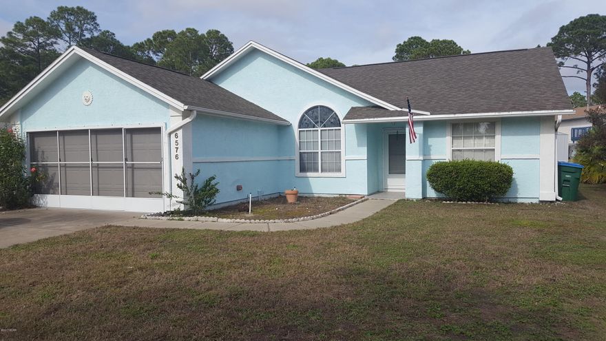 Three Bedroom Home with 59' Waterfront Canal that leads into Bay. Double Garage with Exterior Screen.  Gated Community with 2 pools and small pond.This home sits across from one of the pools and rec area.  Close to Beach, and Hathaway bridge for easy commutes.