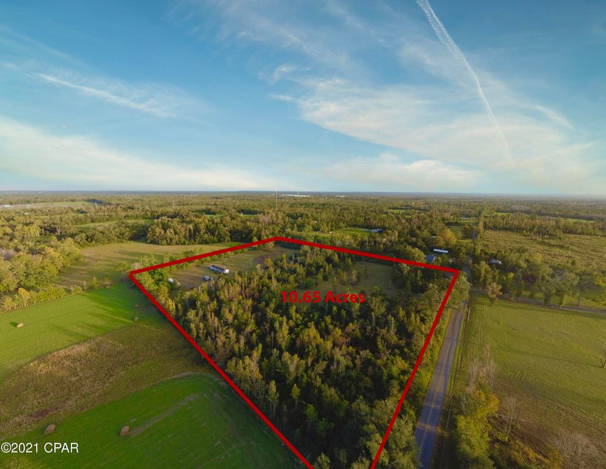 10 Acres off a Paved Rd. just minutes from Downtown Marianna.  Located on a corner parcel, this property has a mixture of woods and pasture just waiting for you to build your dream home.  Property has two mobile homes currently being used as storage buildings.  Structures currently have no value and the seller doesn't warrant anything.  The front one was lived in, with a functioning well and septic, up until 2018 and with some repair it could be livable again. Property is very private and wooded on most of the outside boundary and also features a pond that provides the perfect place for plenty of wildlife.  Make an appointment to see all the features of this property today. 'CURRENTLY UNDER CONTRACT, SELLER ACCEPTING BACKUP OFFERS'