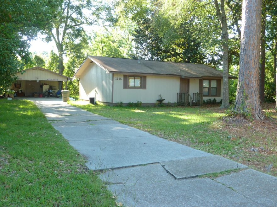 Here is a wonderful Lynn Haven home with a lot of potential. Centrally located and just minutes away from schools, shopping and entertainment,  This home is listed on a very large 100' x 150' lot. There is a great garage garage/workshop out back.  The home is currently is not available to show.  Please check with listing for showing information.